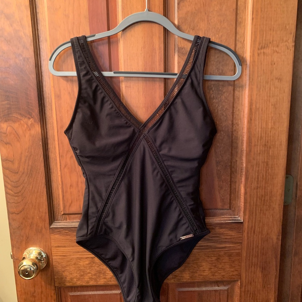 MICHAEL KORS, elegant BLACK ILLUSION one piece swim suit. Size 12. Deep V neck.